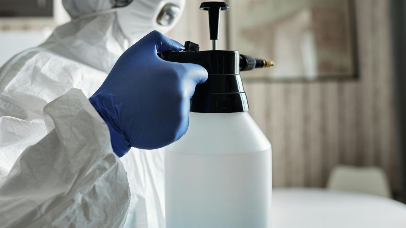 The Real Difference Professional Decontamination Services Make Every Time decontamination services in a chemical suit